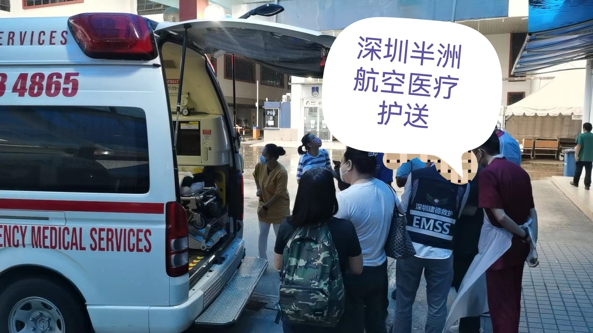 Ambulance handover outside an overseas hospital